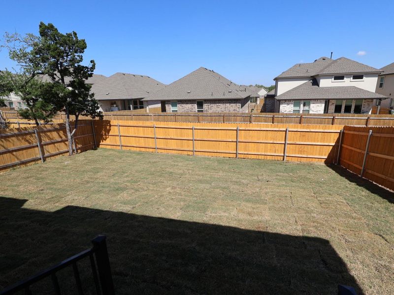 Exterior details and patio area of a home in Cedar Brook, Leander (Image 13).