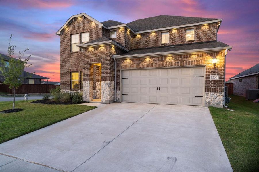 Front exterior of a new home in Northstar, Haslet, TX, highlighting curb appeal (Image 19).