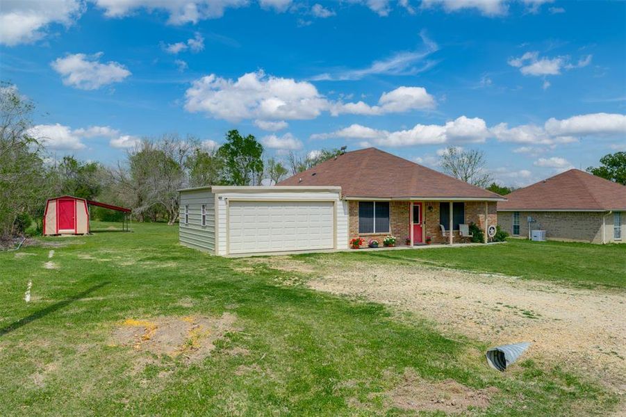 Exterior details and patio area of a home in , Powderly (Image 24).