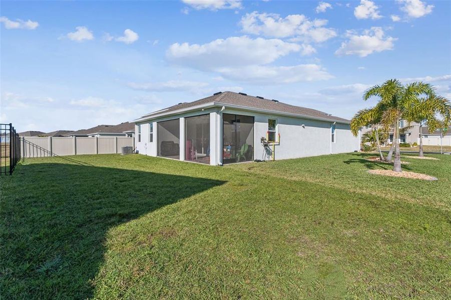 Exterior details and patio area of a home in Bella Lago, Parrish (Image 26).
