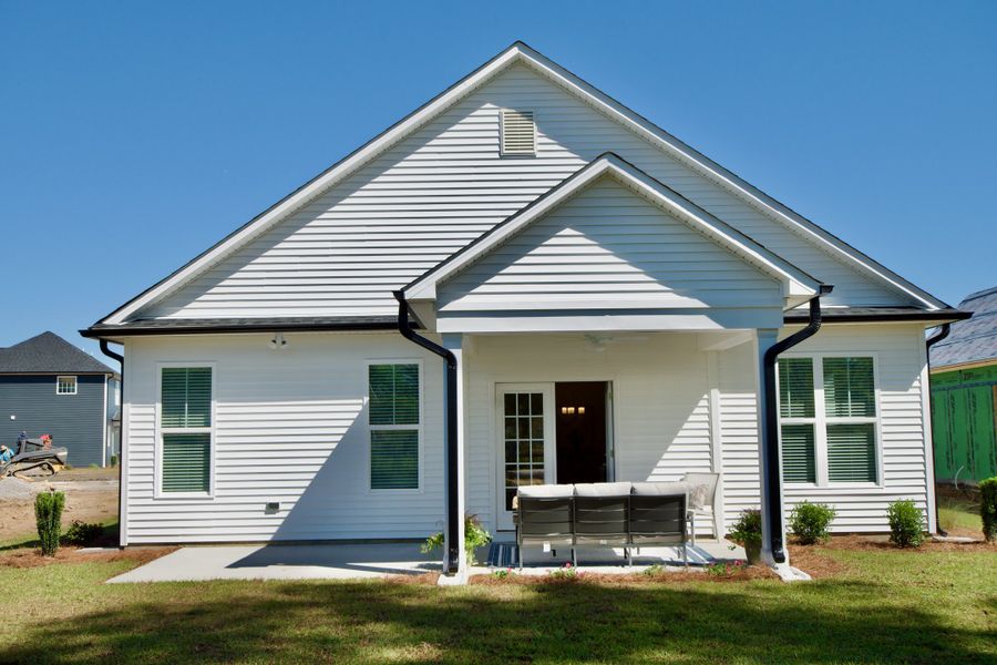 Front exterior of a new home in Parkwood Estates, Leland, NC, highlighting curb appeal (Image 2). Front exterior of a new home in Parkwood Estates, Leland, NC, highlighting curb appeal (Image 2).