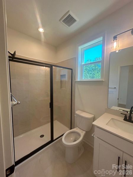 Full bathroom on first floor. Toilet seat and lid will be installed soon. Full bathroom on first floor. Toilet seat and lid will be installed soon.