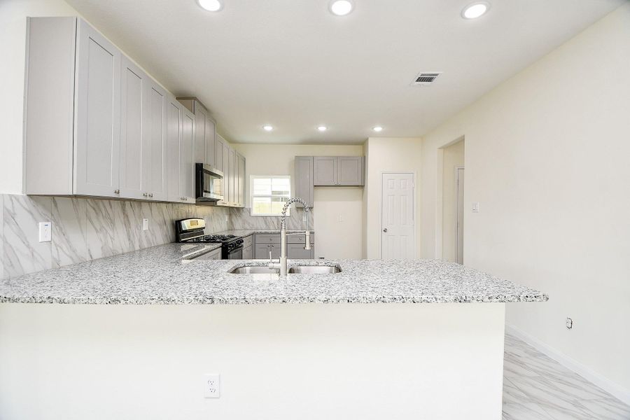 Furnished interior view inside a new home in , Houston (Image 3). Furnished interior view inside a new home in , Houston (Image 3).