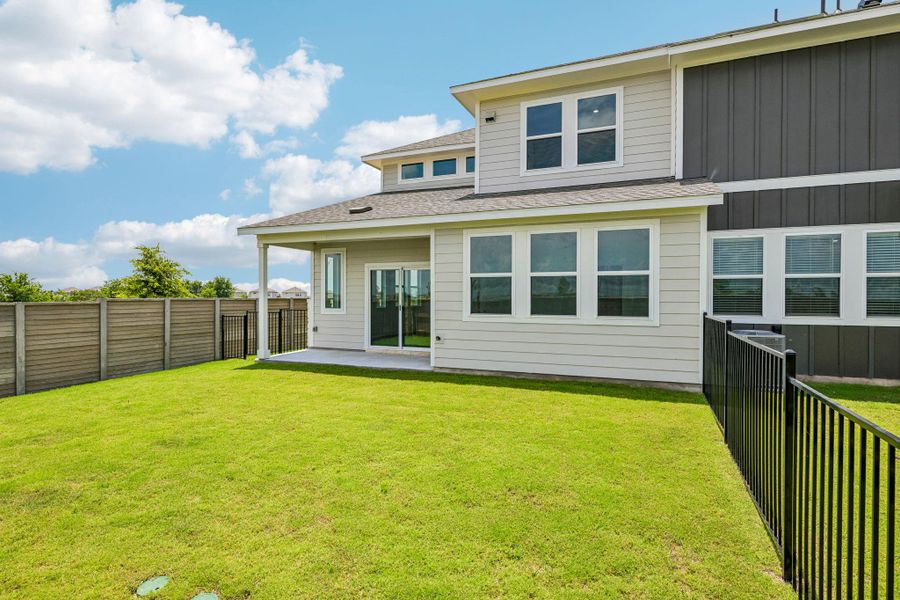 Exterior details and patio area of a home in Avery Centre, Round Rock (Image 3).