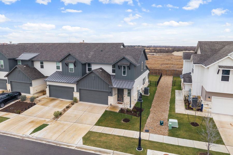Front exterior of a new home in , Round Rock, TX, highlighting curb appeal (Image 18).