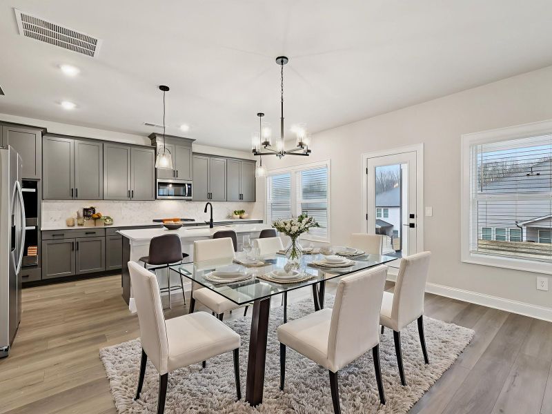 Furnished interior view inside a new home in Vines at Mill Creek - Estate Series, Braselton (Image 4).