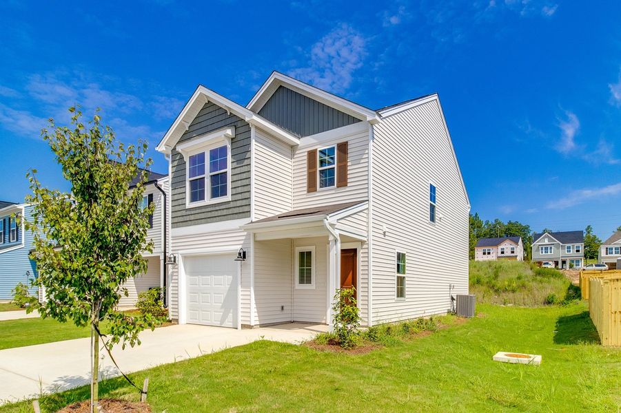 Front exterior of a new home in Bluefield, Lexington, SC, highlighting curb appeal (Image 19).