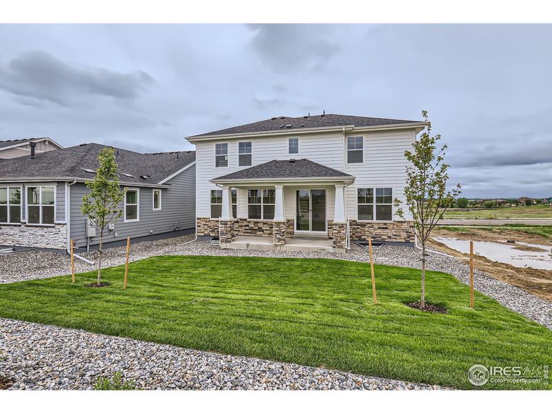 Exterior details and patio area of a home in Barefoot Lakes, Longmont (Image 19).