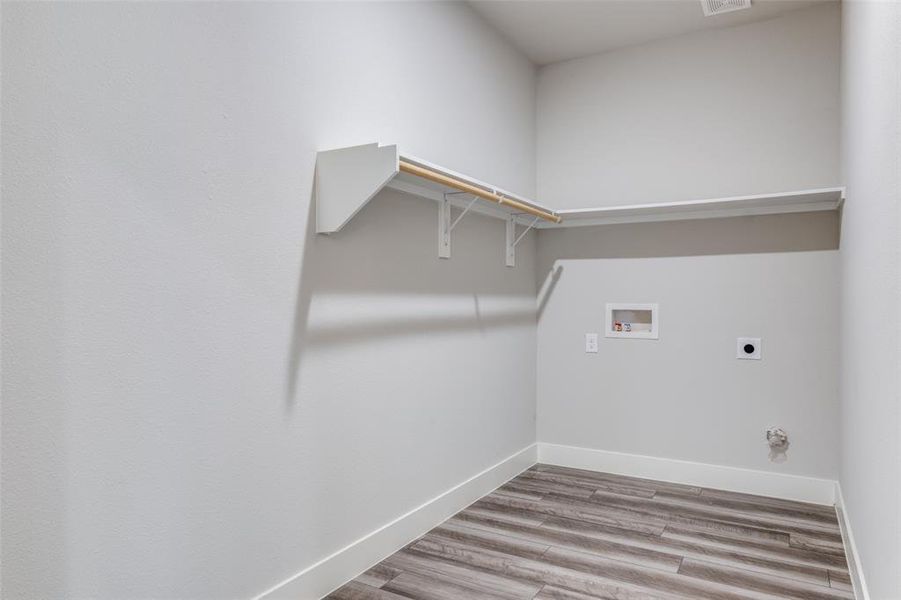 Similar home: Laundry room with hookup for an electric dryer and washing machine