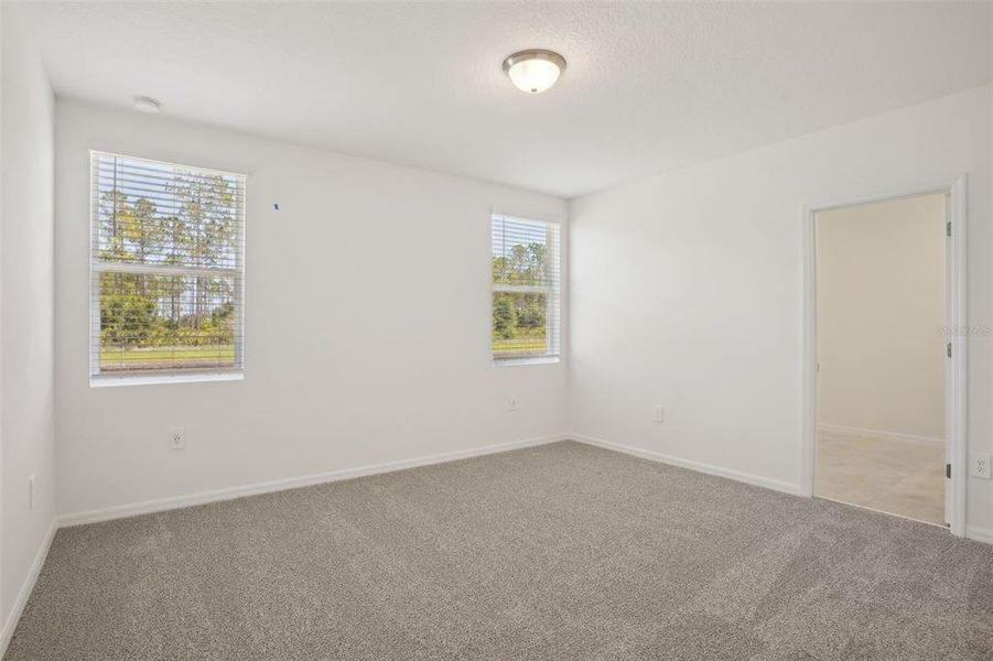 Spacious, unfurnished interior of a new home in Lake Deer Estates - Signature Series, Poinciana (Image 36). Spacious, unfurnished interior of a new home in Lake Deer Estates - Signature Series, Poinciana (Image 36).