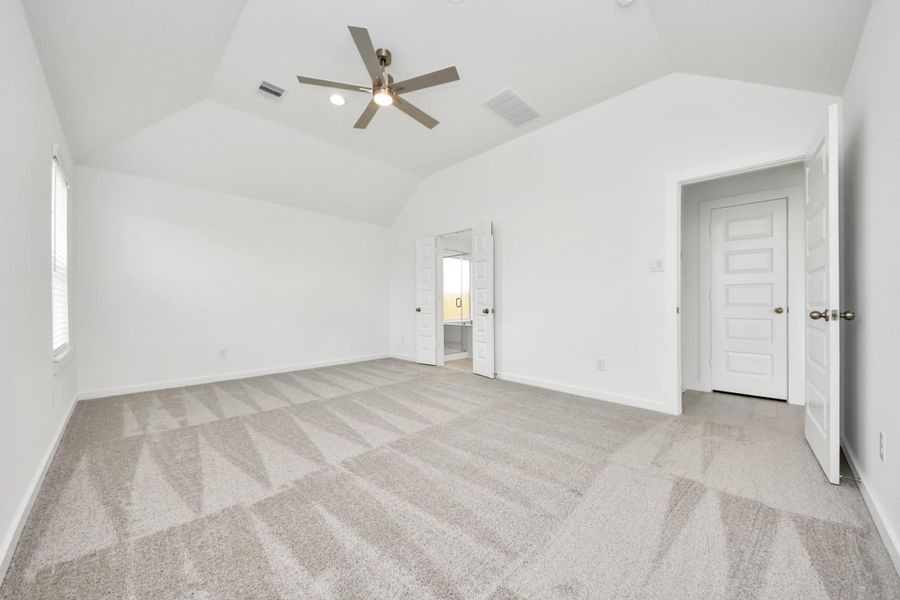 Come and unwind after a long day in this magnificent primary suite! This spacious room features plush carpet, warm paint, high ceilings and large windows with privacy blinds. Sample photo of completed home with similar floor plan. Actual colors and selections may vary. Come and unwind after a long day in this magnificent primary suite! This spacious room features plush carpet, warm paint, high ceilings and large windows with privacy blinds. Sample photo of completed home with similar floor plan. Actual colors and selections may vary.