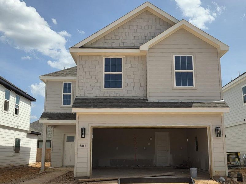 In-progress construction of a new home in River's Edge, Conroe, TX (Image 26).