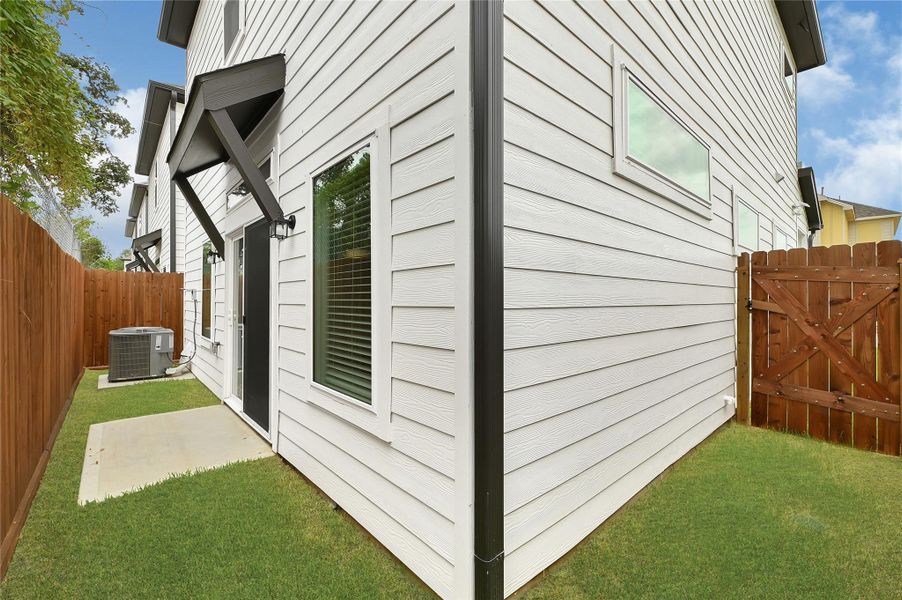 Exterior details and patio area of a home in , Houston (Image 18).