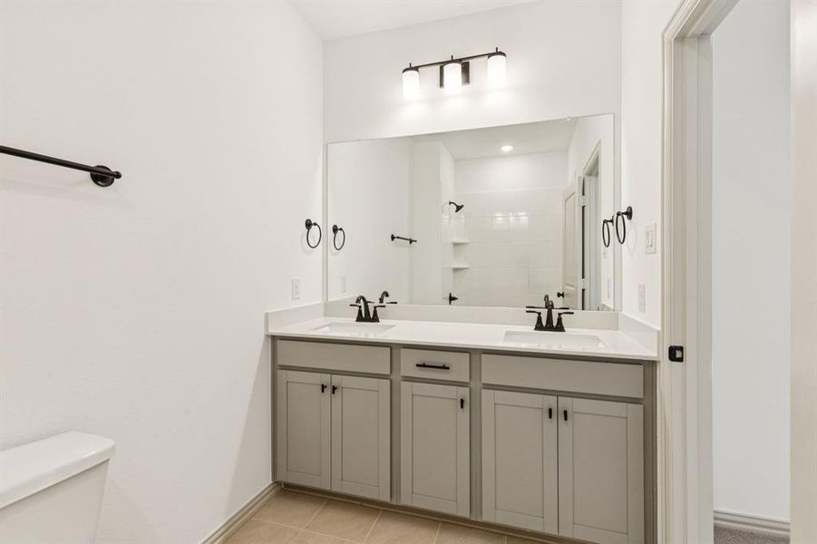 Friends and family will feel right at home in this beautifully finished guest bath.