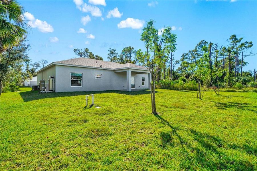 Exterior details and patio area of a home in , North Port (Image 23).