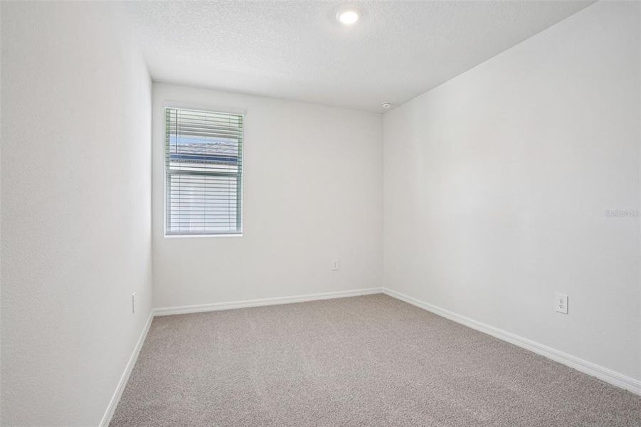 Spacious, unfurnished interior of a new home in Ridgehaven - Villas, Ormond Beach (Image 36).