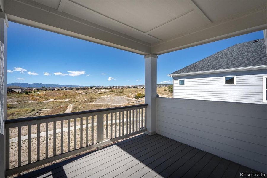 Exterior details and patio area of a home in Revel Crossing at Wolf Ranch - The Panorama Collection, Colorado Springs (Image 26).