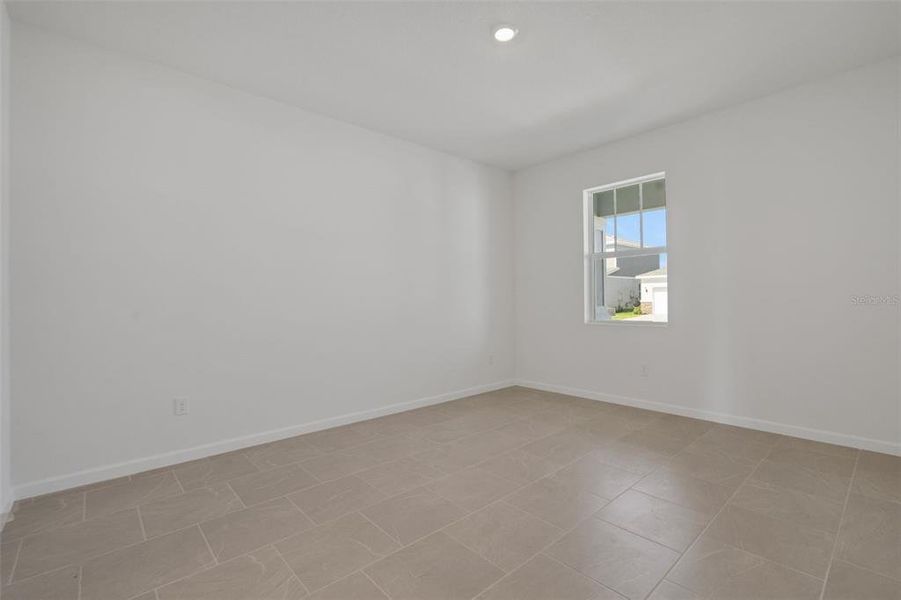 Spacious, unfurnished interior of a new home in Brystol North at Wylder, Port St. Lucie (Image 11).