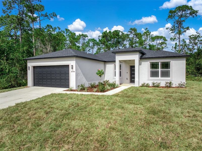Front exterior of a new home in , Sebring, FL, highlighting curb appeal (Image 24).