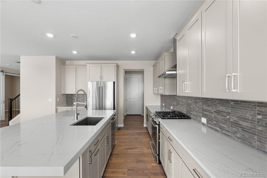 Furnished interior view inside a new home in Portrait at The Canyons, Castle Pines (Image 11).