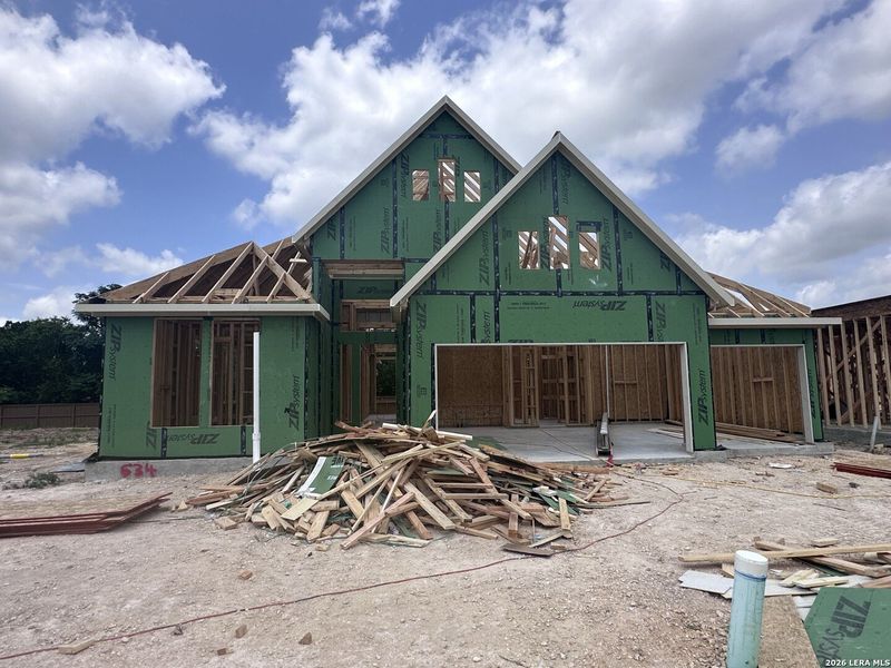 In-progress construction of a new home in Village at Three Oaks, Seguin, TX (Image 21).