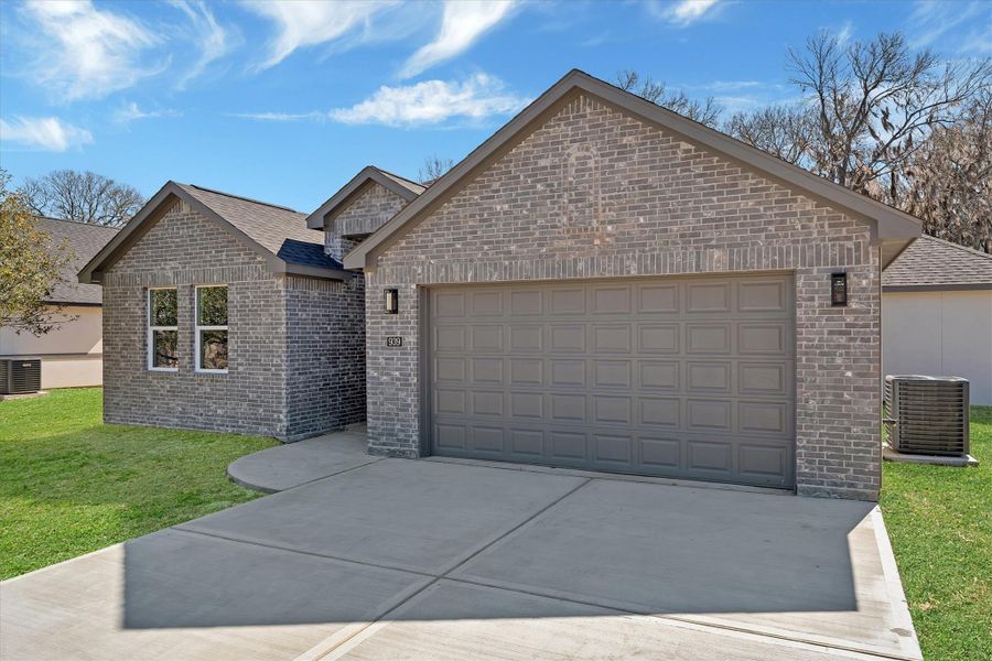 Front exterior of a new home in , Montgomery, TX, highlighting curb appeal (Image 20).
