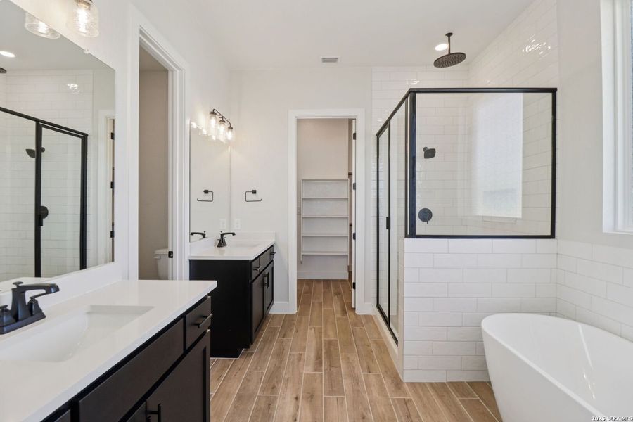Furnished interior view inside a new home in Village at Three Oaks, Seguin (Image 6).