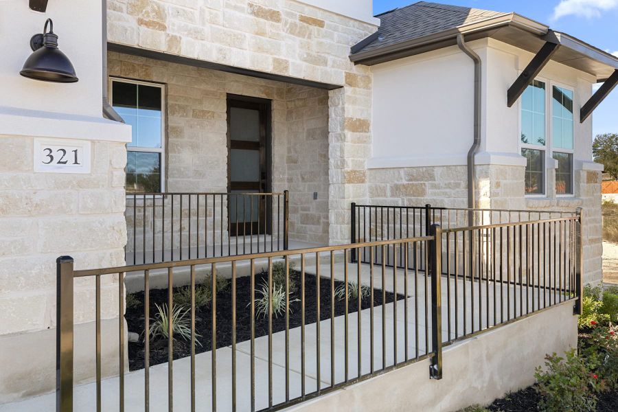 Exterior details and patio area of a home in Lariat, Liberty Hill (Image 3).