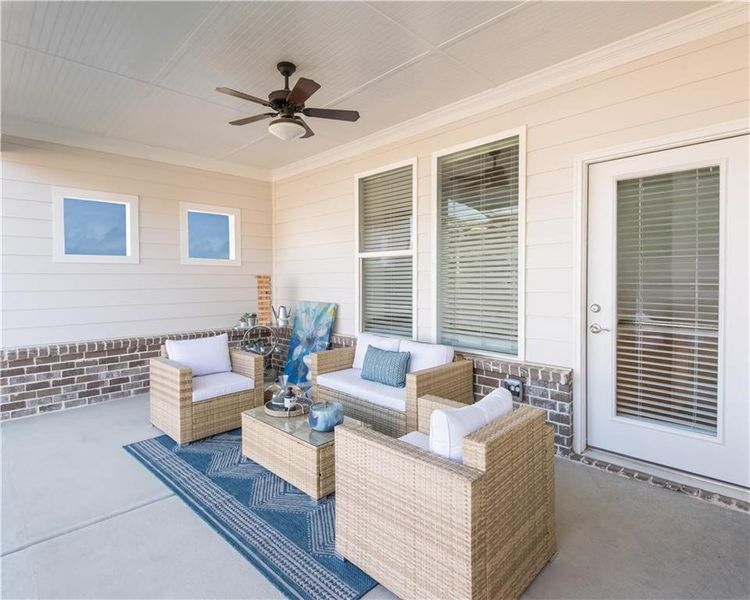 Exterior details and patio area of a home in Cooper's Walk, Loganville (Image 20).