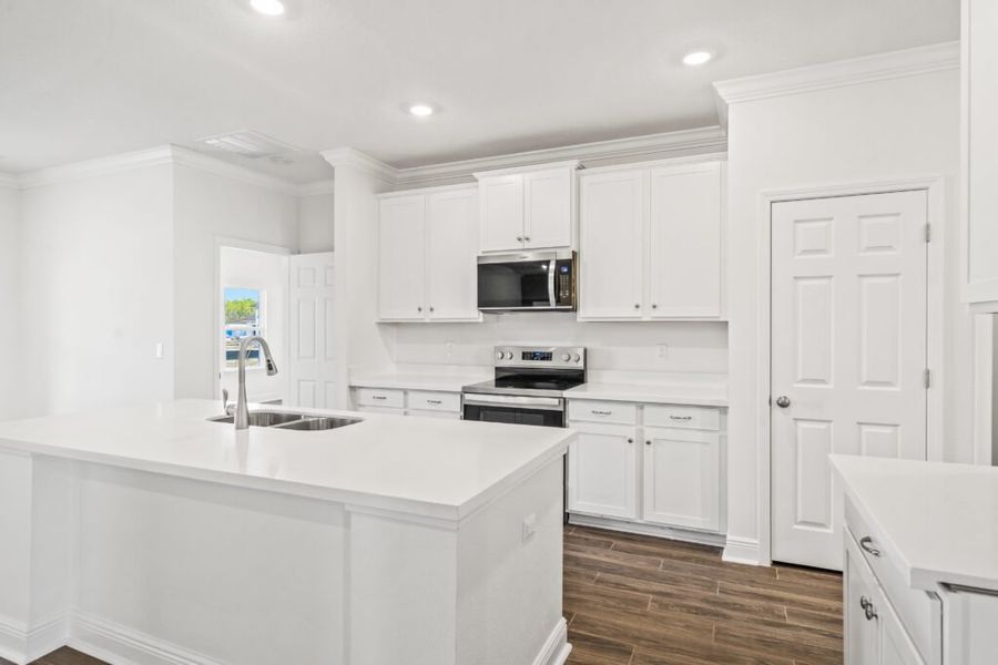 Furnished interior view inside a new home in Natureview, Freeport (Image 10).