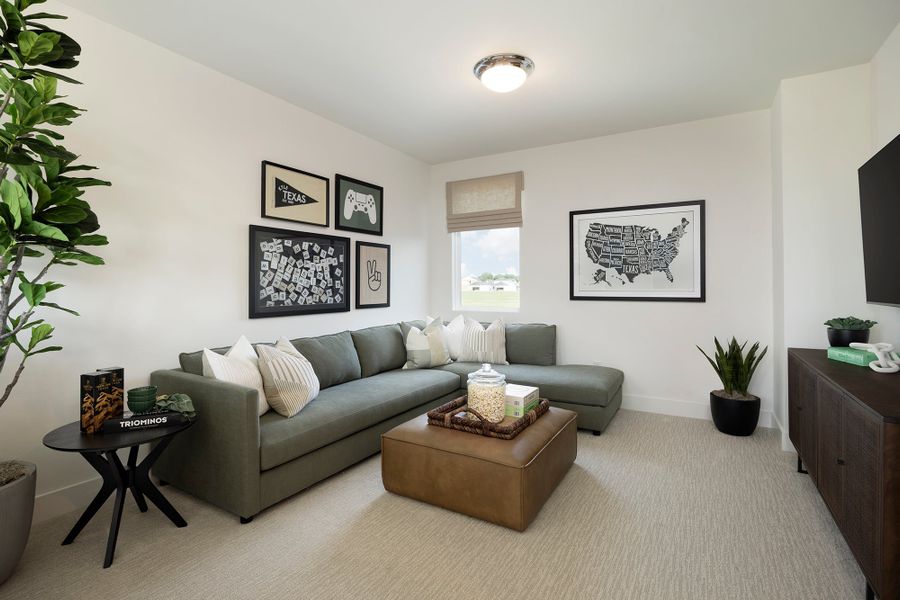 Representative furnished interior of a home built from the 3554 by Risewell Homes in Parkton Square, Kyle (Image 12).