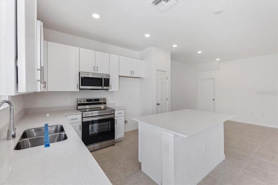 Furnished interior view inside a new home in Brixton, St. Cloud (Image 6).