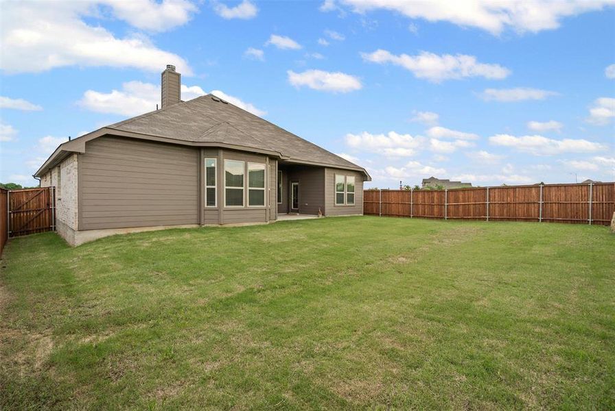 Exterior details and patio area of a home in , Godley (Image 25).