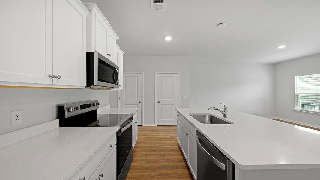 Furnished interior view inside a new home in Garbon Fields, Summerville (Image 9).