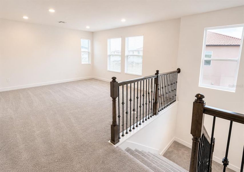 Spacious, unfurnished interior of a new home in Triple Creek: The Executives, Riverview (Image 18).