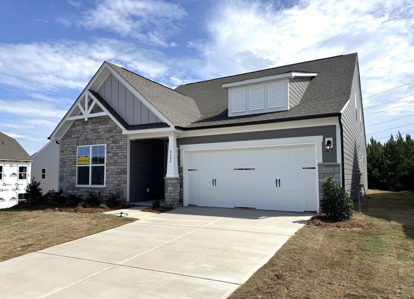 Front exterior of a new home in The Enclave at Laurelbrook, Sherrills Ford, NC, highlighting curb appeal (Image 2).