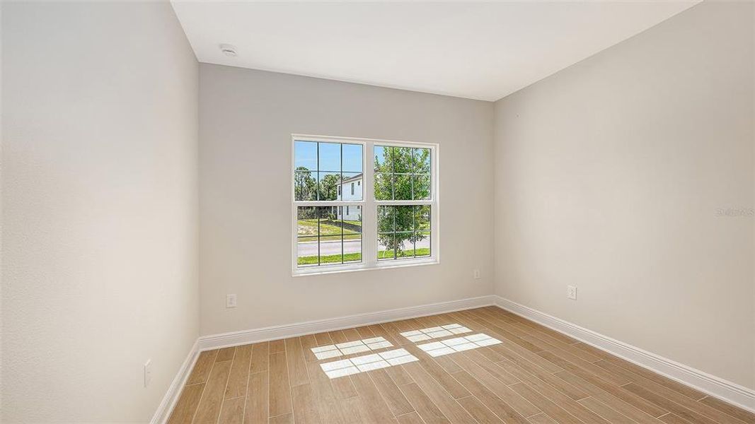 Spacious, unfurnished interior of a new home in Grand Park, Sarasota (Image 41).