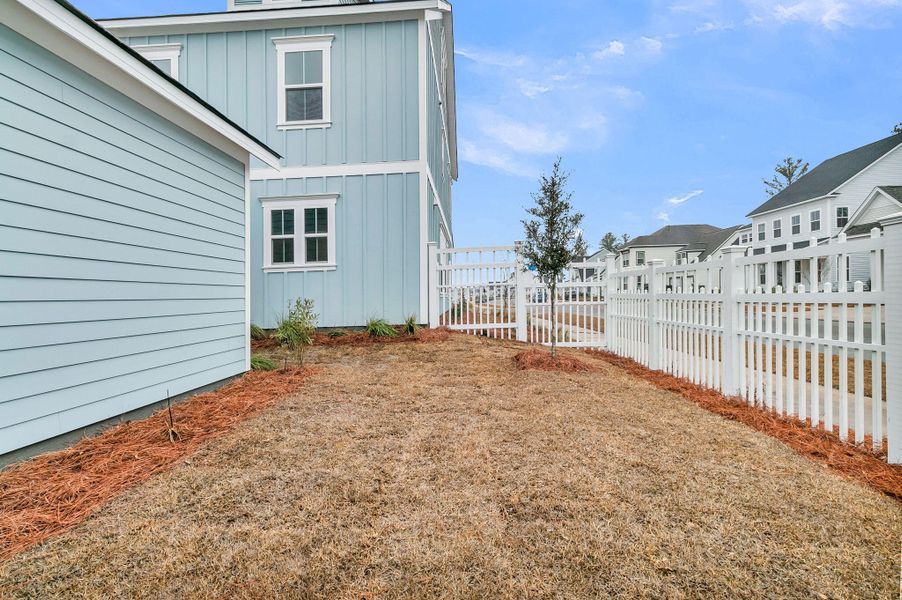 Exterior details and patio area of a home in Midtown at Nexton, Summerville (Image 29).