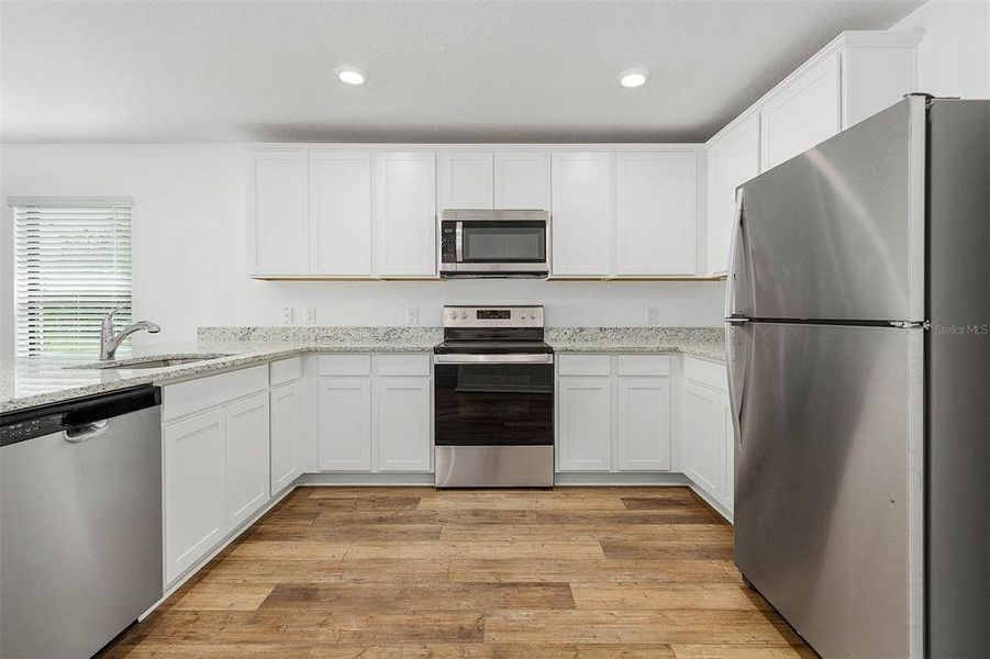 Furnished interior view inside a new home in , Port Charlotte (Image 4).