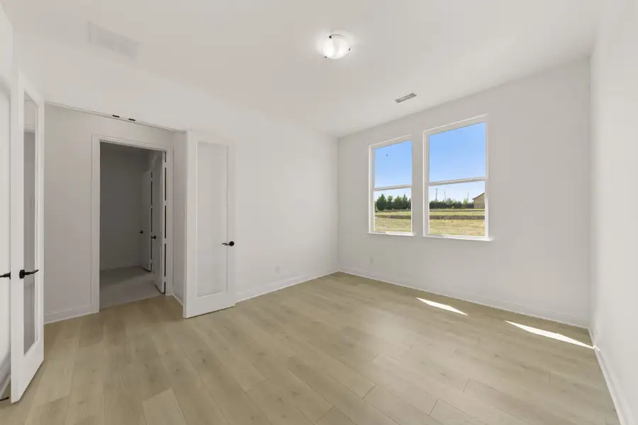 Spacious, unfurnished interior of a new home in Nelson Lake Estates, Rockwall (Image 19).