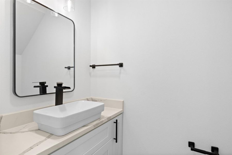 Half bathroom on the first floor Half bathroom on the first floor