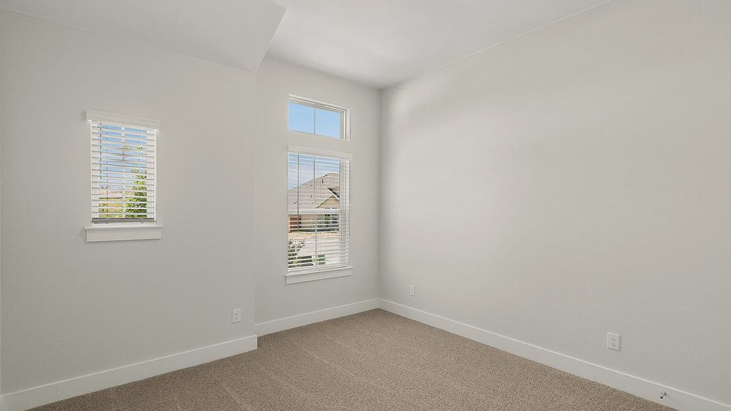 Representative unfurnished interior of a home built from the Brenner by Chesmar Homes in Newhaven, Manor (Image 22).