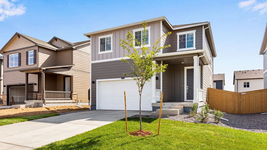 Front exterior of a new home in Prairie Song, Windsor, CO, highlighting curb appeal (Image 2).