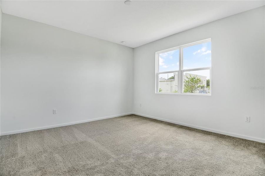 Spacious, unfurnished interior of a new home in Seasons at Shores of Lake Dell, Dundee (Image 13).