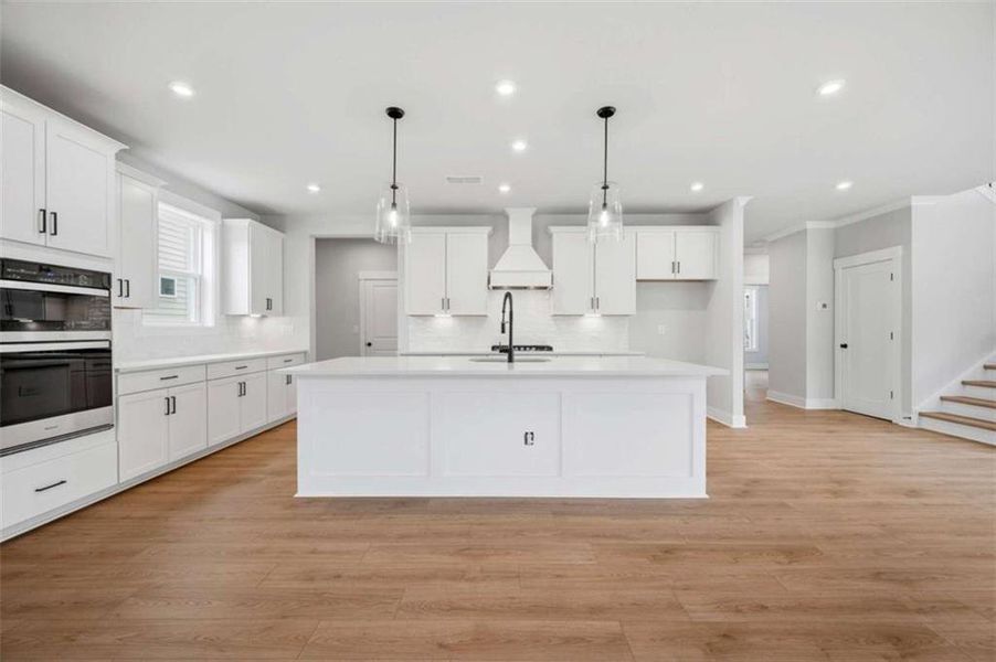 Furnished interior view inside a new home in The Paddocks at Doc Hughes, Buford (Image 9).