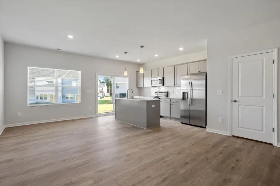 Furnished interior view inside a new home in West Main Townhomes, Sanford (Image 4).