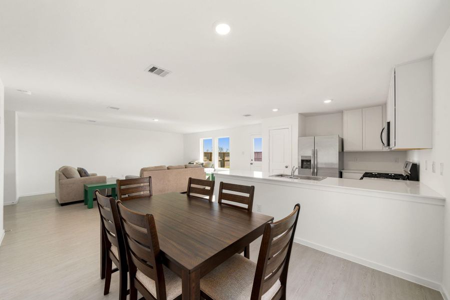 Furnished interior view inside a new home in Emberly: Cottage Collection, Beasley (Image 14).