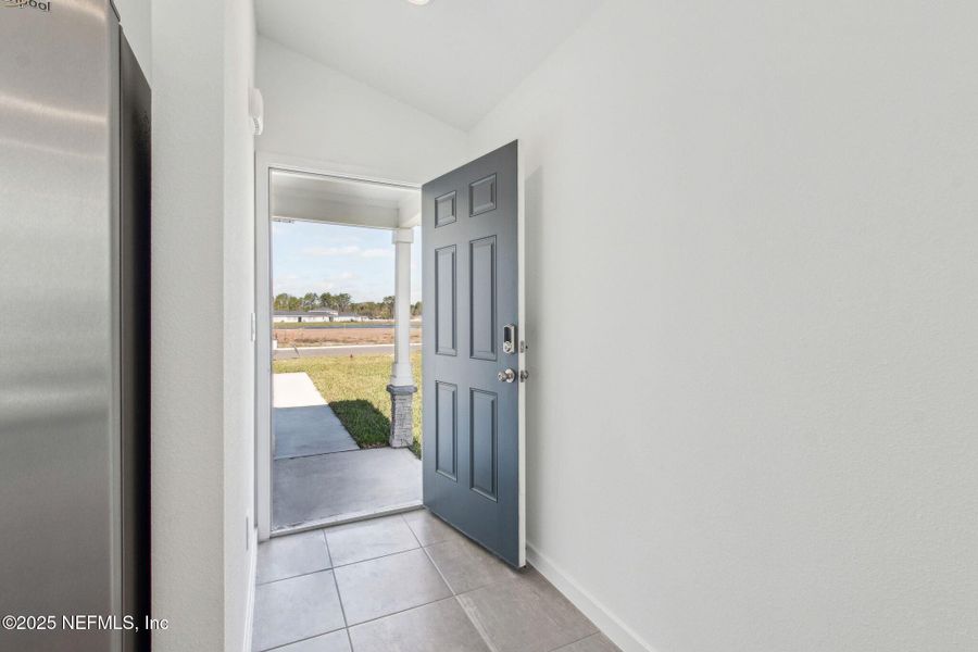 Exterior details and patio area of a home in Flagler Village - Classic Series, Palm Coast (Image 4).