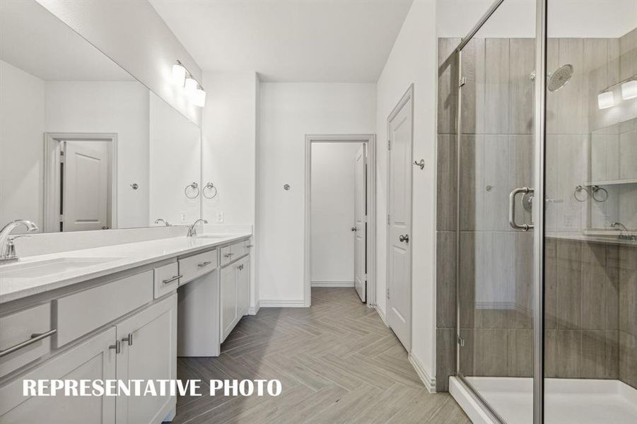 No shortage of space or style in this wonderful owner's bath!  REPRESENTATIVE PHOTO