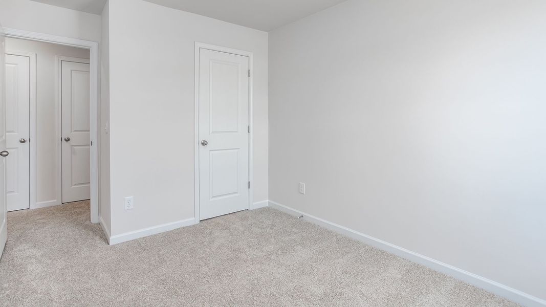 Spacious, unfurnished interior of a new home in The Gables at Edinborough Townes, Gibsonville (Image 19).